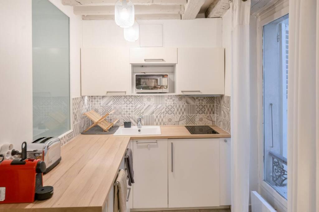 Cosy Appartement En Plein Marais Paris Exterior foto