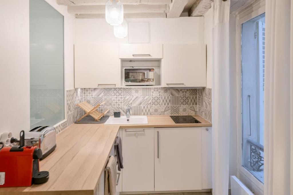 Cosy Appartement En Plein Marais Paris Exterior foto